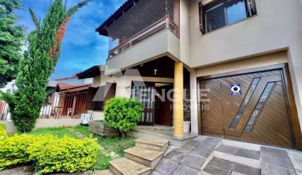 Casa com 4 quartos à venda na Rua Juruá, 105, Cristo Redentor, Porto Alegre por R$ 1.190.000