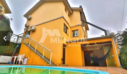 Casa em condomínio fechado com 3 quartos à venda na Rua Vicenza, 20, Mário Quintana, Porto Alegre por R$ 595.000