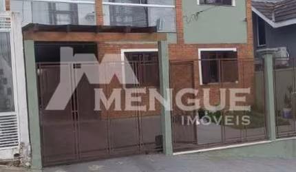 Casa em condomínio fechado com 3 quartos à venda na Rua Madre Celina Maria Azambuja, 100, Mário Quintana, Porto Alegre por R$ 834.900