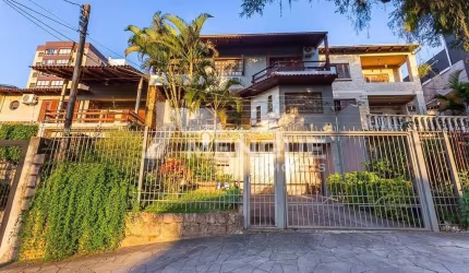 Casa com 6 quartos à venda na Rua Fernando Abbott, 1055, Cristo Redentor, Porto Alegre por R$ 1.300.000