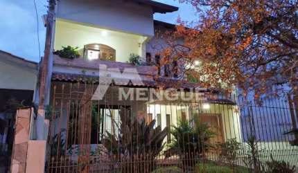 Casa com 4 quartos à venda na Rua Doutor José Éboli, 87, Jardim Itu Sabará, Porto Alegre por R$ 750.000