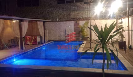 Casa com 4 dormitórios à venda, 217 m² por R$ 1.070.000,00 - Macuco - Santos/SP