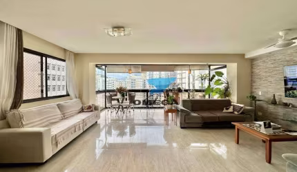Apartamento reformado com vista mar à venda na Praia das Pitangueiras no Guarujá I Omega Imoveis