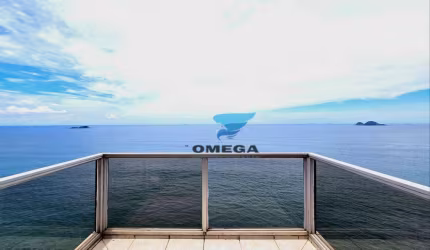 Apartamento com vista mar à venda na praia das Pitangueiras no Guarujá I Omega Imoveis