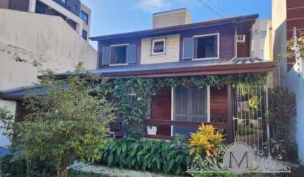 Casa com 4 quartos à venda na Rua Nilo Cordeiro Dutra, Carvoeira, Florianópolis por R$ 1.400.000