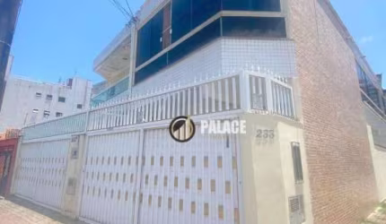 Sobrado com 3 dormitórios à venda, 122 m² por R$ 615.000,00 - Aviação - Praia Grande/SP