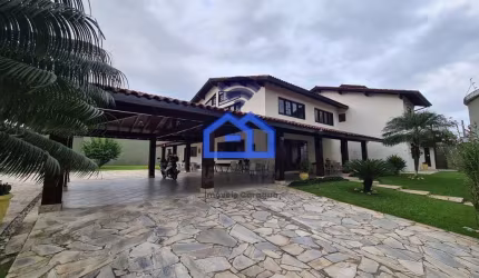 Sobrado de alto padrão à venda no bairro Martim de Sá com 4 suítes, 2 salas, piscina, área gourmet