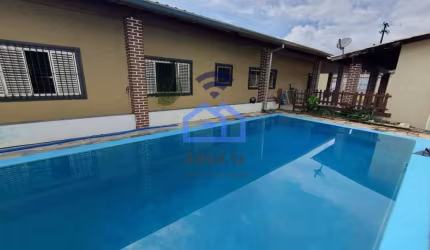 Casa à venda no bairro do Porto Novo - 3 dormitórios, sendo uma suíte, área gourmet, piscina, vaga