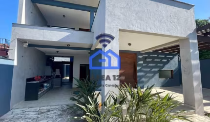 Sobrado moderno para locação com 03 suítes, churrasqueira e forno a lenha no bairro do Indaiá em Ca