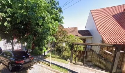 Casa com 4 quartos à venda na Rua Alcebíades Antônio dos Santos, 513, Nonoai, Porto Alegre por R$ 980.000