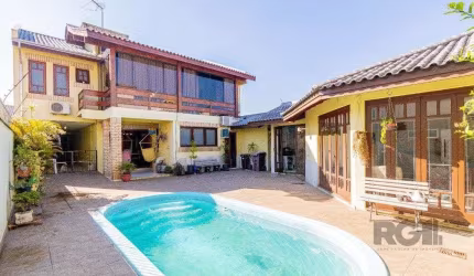 Casa de 4 dormitórios 304m² no bairro Jardim Lindóia