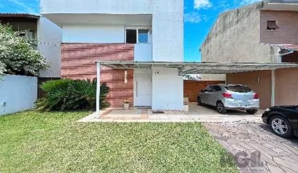Casa em Porto Alegre, no bairro Hípica, com 3 dormitório(s), e 3 banheiros, à venda.