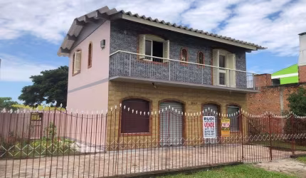 Sobrado com 2 lojas comerciais no térreo Avenida Rio Grande do sul Mathias Velho
