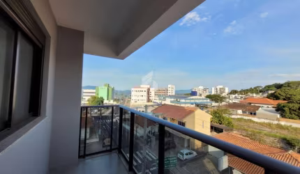 Apartamento novo à venda com 03 dormitórios, sendo 01 suíte, no bairro Praia Comprida, em São José-SC