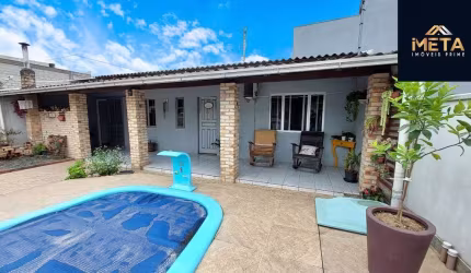 Casa com 4 quartos à venda na Rua José Luiz Maximo Pereira, 155, São Domingos, Navegantes por R$ 700.000