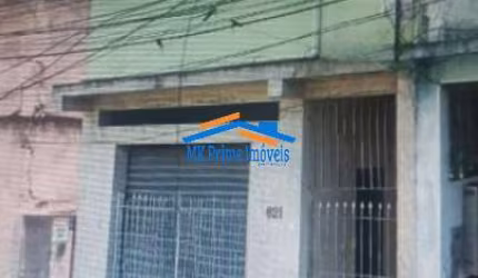 Ótima Imóvel Para Renda com 3 Casas e 1 Salão Comercial.