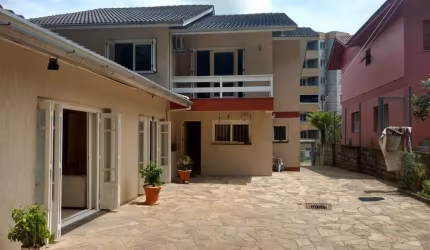 Casa com 4 quartos à venda na Rua Capitão Artemim Karan, 555, Santa Catarina, Caxias do Sul por R$ 1.090.000