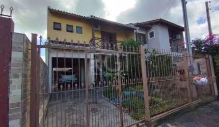 Casa em Porto Alegre, no bairro Hípica, com 3 dormitório(s), e 3 banheiros, à venda.