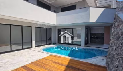 Casa em condomínio de alto padrão à venda, com 3 dormitórios sendo 3 suítes, área gourmet com piscina e cozinha, 6 vagas de garagem!