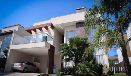 Casa com 3 dormitórios à venda, 298 m² por R$ 2.345.000,00 - Condomínio Villagio Firenze - Cachoeirinha/RS