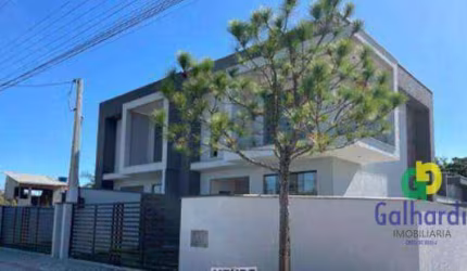 Sobrado com 3 dormitórios sendo 1 suite à venda, 120m² por R$ 540.000 - Volta Ao Mundo I - Itapoá/SC