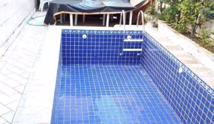 Casa com 3 dormitórios à venda, 219 m² por R$ 1.300.000,00 - Campo Grande - Santos/SP