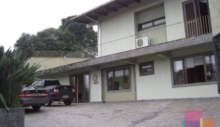 Casa com 3 quartos à venda na Rua Guilherme Tiburtius, --, Saguaçu, Joinville por R$ 620.000