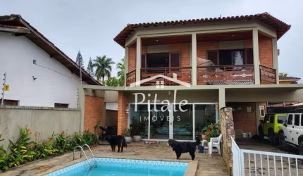 Casa com 3 dormitórios à venda, 287 m² por R$ 1.100.000,00 - Jardim Virginia - Guarujá/SP