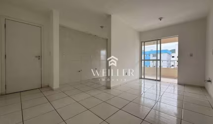 Apartamento com 2 dormitórios à venda, 56 m² por R$ 310.000,00 - Espinheiros - Itajaí/SC