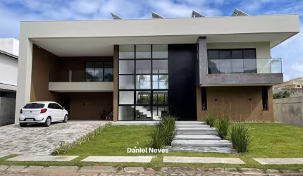 Magnífica mansão em Busca Vida, Camaçari - BA.  624m2 de área construída, Terreno de 892m2 4 Suites sendo 1 master  Sala de tv! A casa será entregue com energia solar com produção