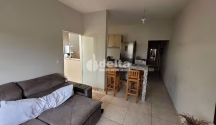 Casa residencial disponível para venda no bairro Jardim Holanda em Uberlândia - MG.
