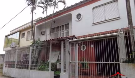 Casa com 6 quartos à venda na Rua Cícero Ahrends, 345, Menino Deus, Porto Alegre por R$ 1.300.000