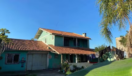 Casa 4 Dormitórios à venda no Bairro Zona Nova com 130 m² de área privativa - 2 vagas de garagem