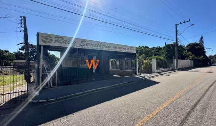 Casa com 4 quartos à venda na Rua Heriberto Hulse, 4530, Barreiros, São José por R$ 1.590.000
