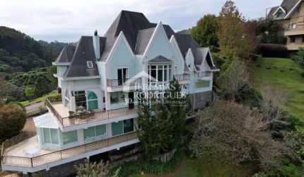 Casa com 4 quartos, 560 m², à venda por R$ 3.800.000- Condomínio Recanto do Sol - Campos de Jordão/SP
