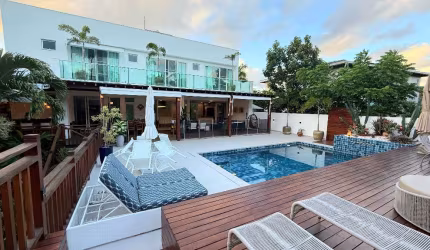 Casa a venda em busca vida com 4 suites piscina área gourmet em condominio fechadp