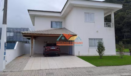 Casa com 4 dormitórios à venda, 221 m² por R$ 1.850.000,00 - Massaguaçu - Caraguatatuba/SP