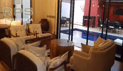 Casa de Alto Padrão para Venda na Vila Giglio em Atibaia, 03 suítes com closet, amplas salas e área gourmet completa integrada com piscina e spa.