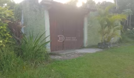 Sobrado à venda no Jardim Regina, Itanhaém - 3 dormitórios, 1 suíte e 4 garagens