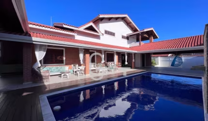 Casa com 6 dormitórios à venda, 453 m² por R$ 1.600.000,00 - Jardim Marcia - Peruíbe/SP