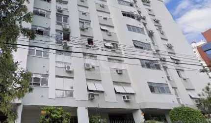 Bairro Menino Deus. Apartamento três(3)dormitórios, uma suíte, living amplo para três ambientes, sacada integrada com churrasqueira, ótima posição solar(leste,norte), cozinha com área de serviço inter
