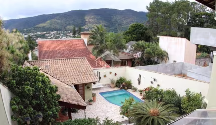 Casa com 3 dormitórios, 401 m² - venda por R$ 2.250.000,00 ou aluguel por R$ 12.510,00/mês - Vila Petrópolis - Atibaia/SP