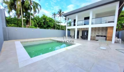 Casa Totalmente reformada em condomínio fechado na praia de Pernambuco no Guarujá!