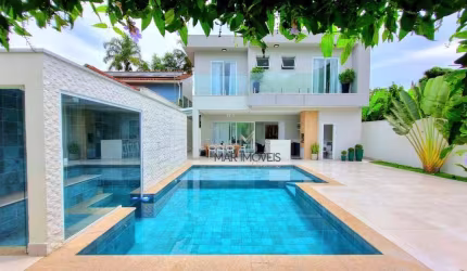 Linda casa em condomínio fechado na região da praia de Pernambuco no Guarujá!