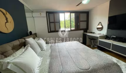Maravilhosa casa para venda com piscina , sauna e jardim.