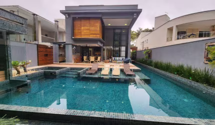 Casa com 5 suítes, 585 m² - venda ou aluguel/mês - Riviera de São Lourenço - Bertioga/SP