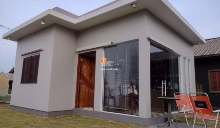 Casa com 2 quartos à venda na Bento Gonçalves, 1040, Praia Paraíso, Torres por R$ 330.000