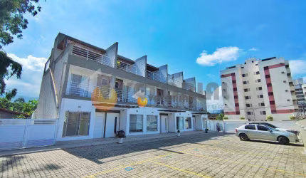 Sobrado com 3 dormitórios à venda, 120 m² por R$ 595.000,00 - Massaguaçu - Caraguatatuba/SP