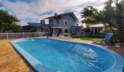 Casa 4 dormitórios à venda Igra Norte Torres/RS
