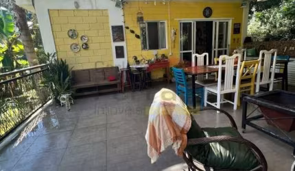 Casa estilo chácara em meio a Serra da Cantareira, no Condomínio Pq Suíça